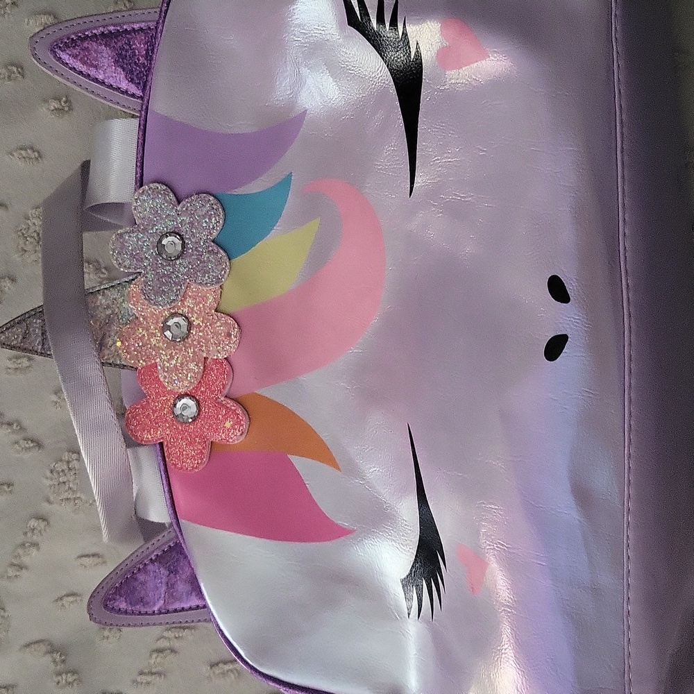 Miss Gwen's OMG purple duffle bag